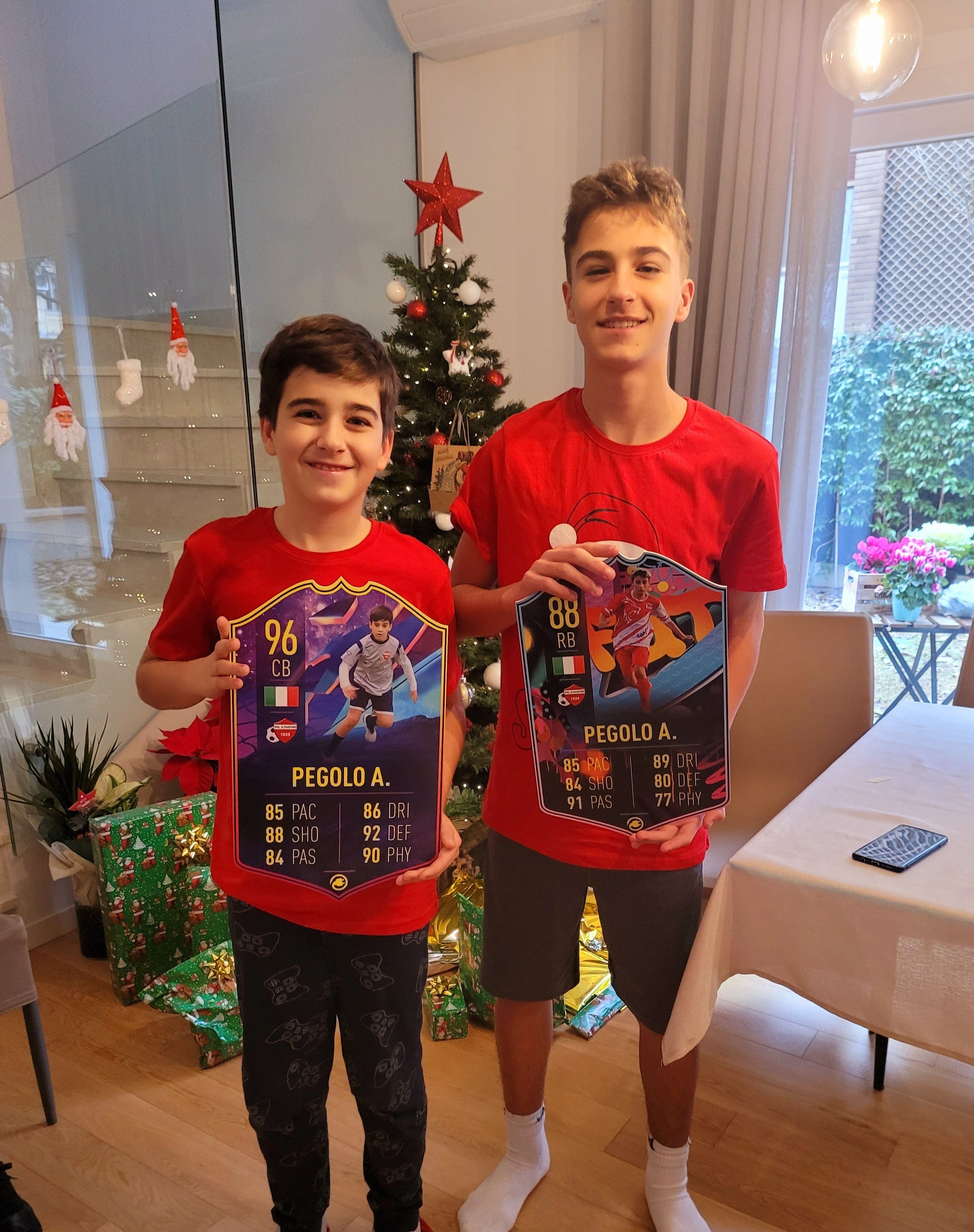 Two CardsPlug customers holding their personalised cards